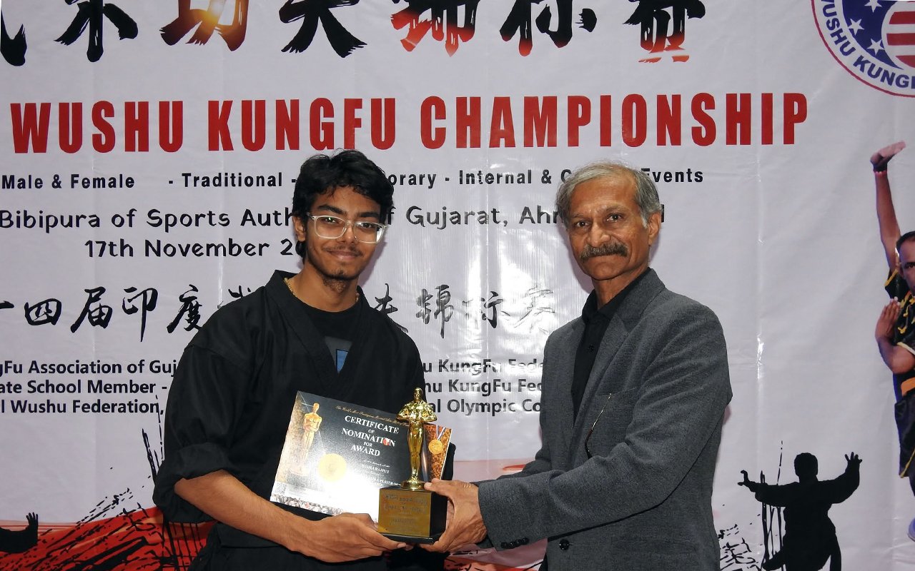 professional wushu martial arts athlete performing sword form